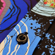 Load image into Gallery viewer, Midsection button view of the Twi-Fright Zone 7-Strong button down, featuring various shade of blue and black portals opening on a black background with various haunting creatures emerging from them.