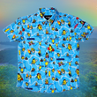 Load image into Gallery viewer, Full, centered, close up view of the 7-Strong Avocado Coast button down featuring various avocado characters engaging in summer activities such as grilling, playing volleyball, weightlifting, surfing, etc against a blue shimmery wave looking background. The shirt is displayed on a coastal rainforest background.