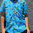 Load image into Gallery viewer, Male model, face not shown, against a gray stone wall, wearing the 7-Strong youth Avocado Coast button down, straight to camera.