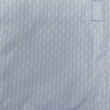 Load image into Gallery viewer, Close up of the seamless pocket view, with bolt pocket tag, of the baby blue short sleeve EveryWEAR adult button up. Pattern is subtle white 7-Bolts lined up all against each other across a baby blue background. The shirt is featured on a soft background of a wave hitting the beach.