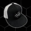Load image into Gallery viewer, Close up centered , yet angled shot of the 7-Strong black "Branded" trucker hat with raised X-Badge patch centered on the front of the hat. Product is featured against a black geometric background.
