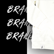 Load image into Gallery viewer, 3/4, left aligned view of the front of the 7-Strong white 'Branded' hoodie, featuring a small 7-bolt logo tag on the hip opening. Hoodie is featured against a half black/half white background with the word "BRANDED" written three times down the middle.