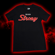 Load image into Gallery viewer, Full look at the Black 7-Strong Sideline Script tee, with white SEVEN and red scripted STRONG across the chest. Shirt is on the back of a red and black fusion background.