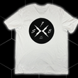Load image into Gallery viewer, Centered full view of the back of the 7-Strong white Branded tee, featuring the X-Brand patch logo centered in black. Shirt is featured against a black geometric background.