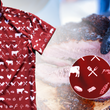 Load image into Gallery viewer, A 3/4 full view of the 7-Strong youth "Smoke Show" button up, a deep maroon red colored shirt with rows of various barbecue and cookout related items and delicacies silhouetted in white. The shirt is displayed against a background of a brisket being pulled. The bottom right features a detail circle showing a close-up of elements in the design.