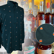 Load image into Gallery viewer, Full display view of the 7-Strong "Straight Sippin'" long Sleeve button down. The shirt is a deep green with black ripples as its background, while the foreground has various drinking glasses with various levels of whiskey, some with ice, others without. The shirt is shown against a background of various whiskies and bourbons on a shelf. In the right corner, there is a detail circle showcasing the shirt's glass designs, up close.