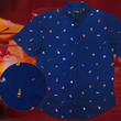 Load image into Gallery viewer, Full layout of "Call Me Old Fashioned" adult short sleeve button-down. Features elements of an Old Fashioned cocktail (bottle of bourbon, glasses, oranges, stirrers, and ice) against a blue background which faintly spells out an Old Fashioned recipe. Shirt is on a background featuring a finished Old Fashioned and has a detail circle in the bottom corner showing design detail.