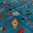 Load image into Gallery viewer, Closeup middle button section view of the 7-Strong "TLC OMG" shirt, a homage to wrestling objects featured all over the shirt including tables, ladders, chairs, ring bells, sledgehammers, brass knuckles, championships, guitars, stop signs, microphones amongst other items. The items are on a blue shirt with a faded steel cage background.