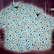 Load image into Gallery viewer, Full view of the 7-Strong "Cheat Day" adult and youth button downs overlapping each other featuring various snacks, treats, and fast food features on a light blue shirt. The shirt is displayed against a background of a gym weight rack.