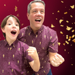 Load image into Gallery viewer, Cheering male models sporting the Cup of Life adult and youth button up, a off-maroon colored shirt decorated throughout with falling gold confetti and depictions of the World Cup statue. The models are standing against a confetti background that matches the shirt design.