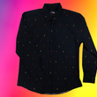 Load image into Gallery viewer, Full view of long sleeve adult button down shirt, black as base color and adorned with multicolored version of our 7-Bolt design. Shirt is on a multicolor gradient-like background, and on along the side left, the logo for onePULSE Foundation, our cause collection partner.