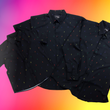 Load image into Gallery viewer, Full view of full RainBOLTS collection, featuring long sleeve adult on right, short sleeve adult middle, and youth short sleeve button down shirts on right, black as base color and adorned with multicolored version of our 7-Bolt design. Shirt is on a multicolor gradient-like background, and on along the side left, the logo for onePULSE Foundation, our cause collection partner.