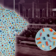 Load image into Gallery viewer, 3/4 view of the 7-Strong "Cheat Day" youth button down featuring various snacks, treats, and fast food features on a light blue shirt. The shirt is displayed against a background of a gym weight rack. Bottom right corner has a close up detail circle showing some of the design features up close.