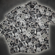 Load image into Gallery viewer, Overlapping full view of the youth and adult 7-Strong "Cinco de Mayhem" button down shirts. Shirt features black and white posters featuring various created luchadors advertised for matches, all overlapping each other over a black shirt. Shirt is displayed on a black gradient background with some of the characters ghosted in the back.