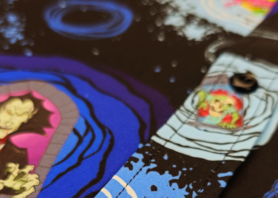 Angled midsection button view of the Twi-Fright Zone 7-Strong button down, featuring various shade of blue and black portals opening on a black background with various haunting creatures emerging from them. The shirt is featured on a similar dark background, with various of the characters seen in the background.