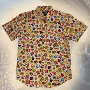 Colorful patterned shirt with various icons on a plain background