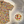 Load image into Gallery viewer, Colorful t-shirt with a pattern of food items displayed in front of a stadium.
