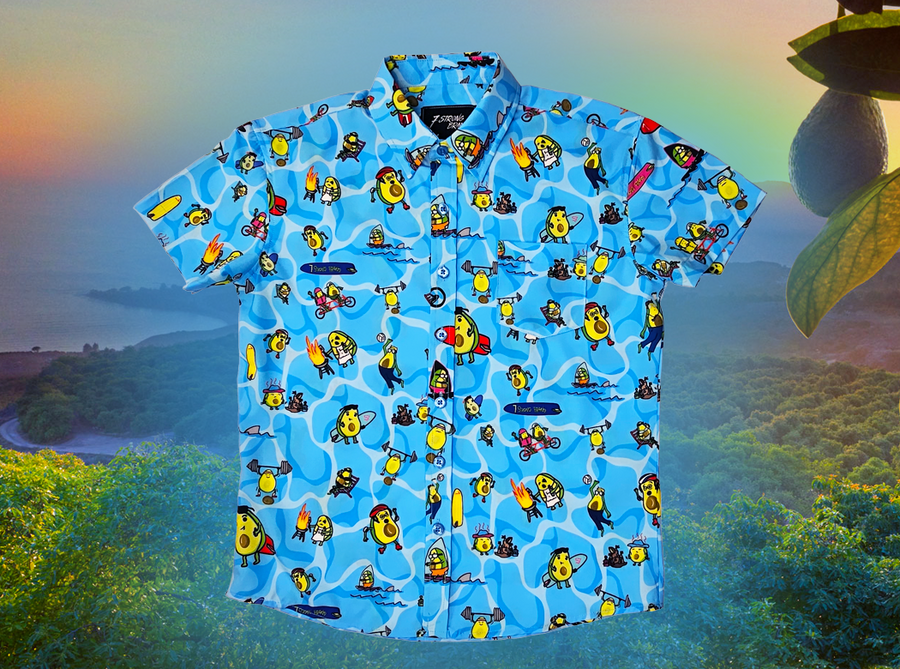 Full, centered, close up view of the 7-Strong Avocado Coast button down featuring various avocado characters engaging in summer activities such as grilling, playing volleyball, weightlifting, surfing, etc against a blue shimmery wave looking background. The shirt is displayed on a coastal rainforest background. 