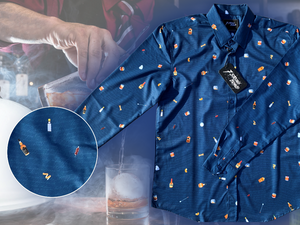 Full layout of "Call Me Old Fashioned" adult long sleeve button-down. Features elements of an Old Fashioned cocktail (bottle of bourbon, glasses, oranges, stirrers, and ice) against a blue background which faintly spells out an Old Fashioned recipe. Shirt is on a background featuring a finished Old Fashioned and has a detail circle in the bottom left corner showing design detail. The shirt is displayed on the background of a bartender making an old fashioned cocktail. 
