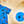 Load image into Gallery viewer, A 3/4 view of the 7-Strong &quot;7-Seas&quot; shirt, a bright blue colored shirt with various nautical depictions such as islands, ships, mermaids, etc - drawn in a treasure map like fashion. The shirt is displayed against a weathered treasure map and compass background. The bottom right features a detail circle with a close up of one of the shirt&#39;s drawings. 
