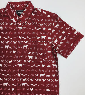 A 3/4 full view of the 7-Strong adult "Smoke Show" button up, a deep maroon red colored shirt with rows of various barbecue and cookout related items and delicacies silhouetted in white.