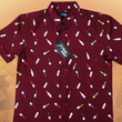 Load image into Gallery viewer, Full view of the 7-Strong &quot;Pour Decisions&quot; button up - deep red in color with various shaped and colored wine bottles patterned throughout in varying directions. Shirt is displayed against a sepia toned vineyard background. 
