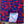 Load image into Gallery viewer, Close up view of the 7-Strong Dat Boil shirt sweep tag, along with design of shirt in deep navy blue with red crawfish patterned throughout overlapping one another. The shirt itself sits on a background image of items from a Crawfish Boil such as crawfish, seasoning, corn, and potatoes. 

