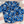 Load image into Gallery viewer, Full view close up of the 7-Strong &quot;Service Stars&quot; Adult and youth button-ups overlapping each other, featuring blue and creme colored camouflage with white weathered stars throughout. The shirt is featured against a waving U.S. Flag faded into the background. Bottom right is the 22 Flag Co logo.
