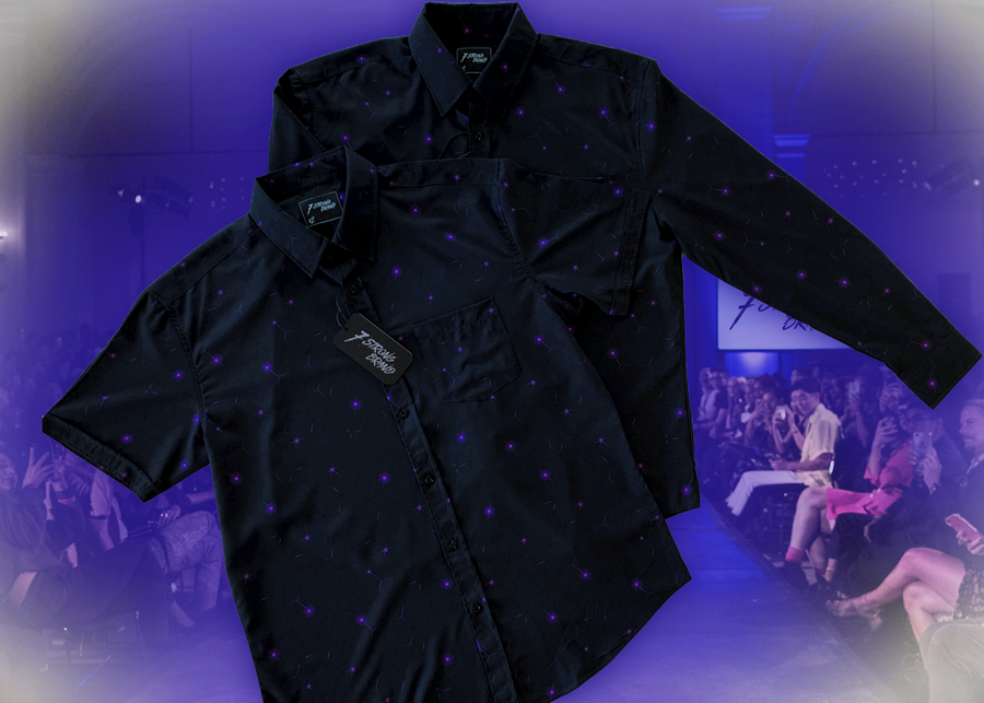 Full of the 7-Strong "Flux Capacity" short sleeve and long sleeve button downs overlapping each other, showcasing bursts and lines of purple light peering through a black grid of cubes. The background is of a fashion show runway in purple hue.