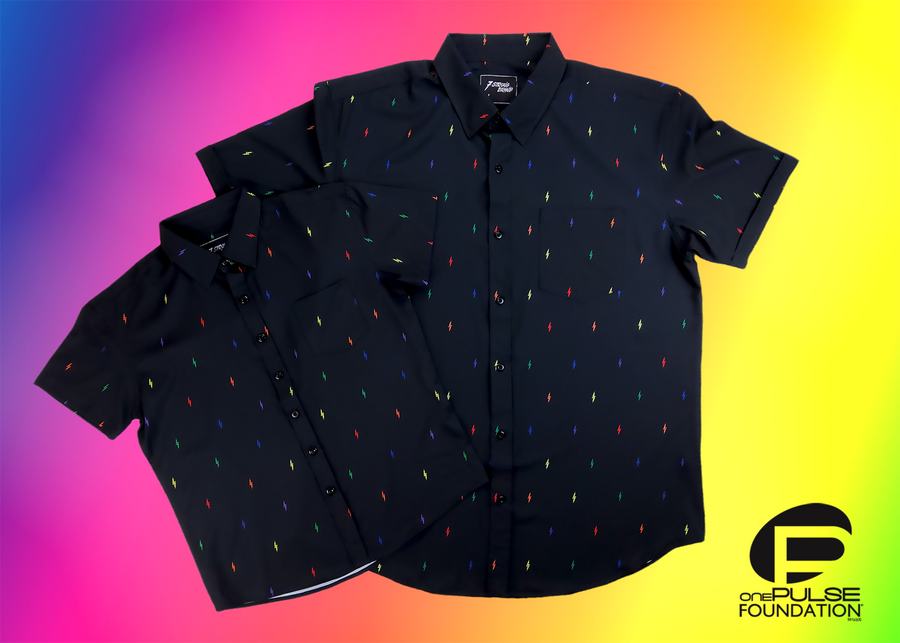 Full view of both adult and youth short sleeve button down shirts, black as base color and adorned with multicolored version of our 7-Bolt design. Shirt is on a multicolor gradient-like background, in the bottom right, the logo for onePULSE Foundation, our cause collection partner. 