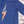 Load image into Gallery viewer, 3/4 view of the navy blue Freedom Bolt hoodie, showcasing a gold outlined 7-bolt with white stars on blue on top and red and white stripes on the bottom. The hoodie is featured on an American flag background. 
