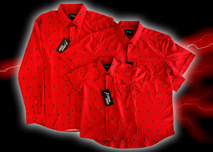 Full view of the full line of 7-Strong Red 7-Bolt shirts overlapping each other, featuring black 7-bolts with a white drop shadow interspersed on a red background. The shirt is featured on a red lightning storm backdrop.