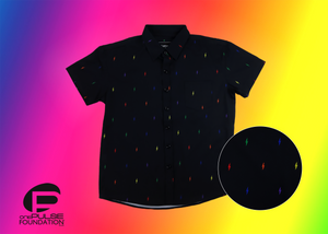 Full view of youth short sleeve button down shirts, black as base color and adorned with multicolored version of our 7-Bolt design. Shirt is on a multicolor gradient-like background, in the bottom left, the logo for onePULSE Foundation, our cause collection partner. On the right, a close up circle of the multicolored 7-bolts featured on the shirt. 