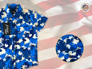 3/4 Full view close up of the 7-Strong "Service Stars" youth button-up, featuring blue and creme colored camouflage with white weathered stars throughout. The shirt is featured against a waving U.S. Flag faded into the background. Top right is the 22 Flag Co logo, bottom left is a detail circle showing a close up of the camouflage and star design. 