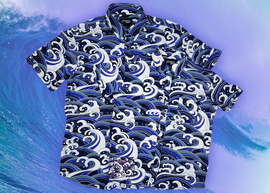 Full view of the 7-Strong "Let 'Er Riptipe" Youth and Adult button down shirts overlapping each other, featuring an array of indigo and purple waves with whitecaps all over. The shirt is featured against a purple tinted background of a wave cresting. 