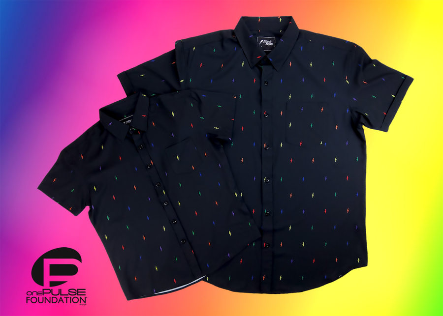 Full view of both adult and youth short sleeve button down shirts, black as base color and adorned with multicolored version of our 7-Bolt design. Shirt is on a multicolor gradient-like background, in the bottom left, the logo for onePULSE Foundation, our cause collection partner.